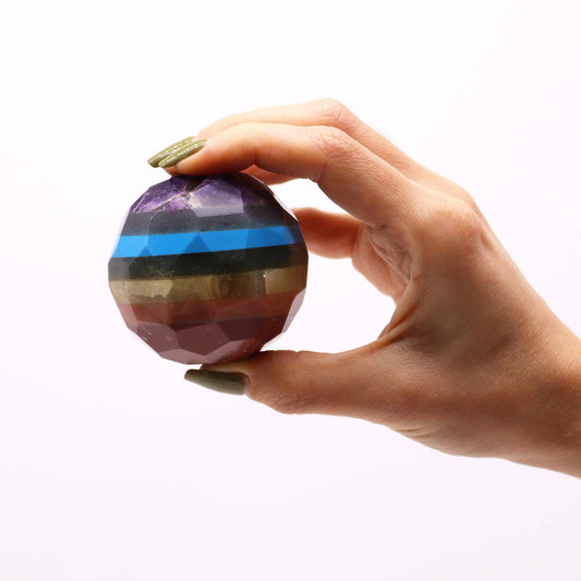 Seven Chakra Faceted Healing Ball on Wooden Stand - Crystal Nest