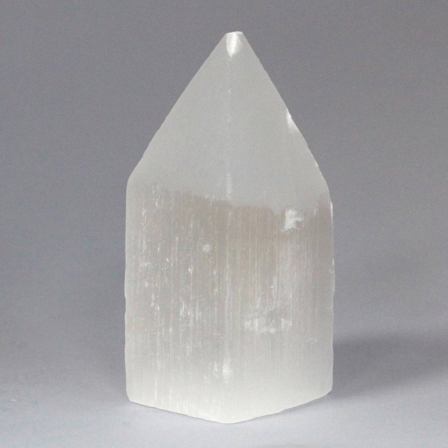 Selenite Pencil Point Tower 10 cm - Crystal Nest