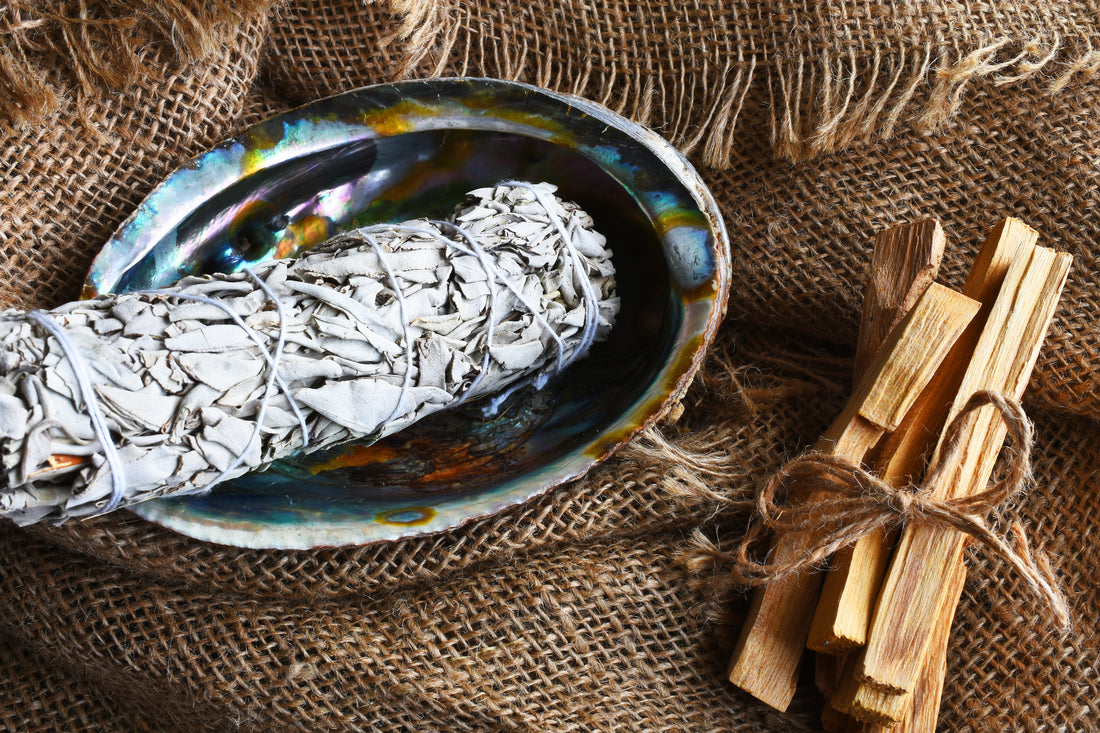 Sacred Smoke: The History and Benefits of Smudging with Sage & Palo Santo
