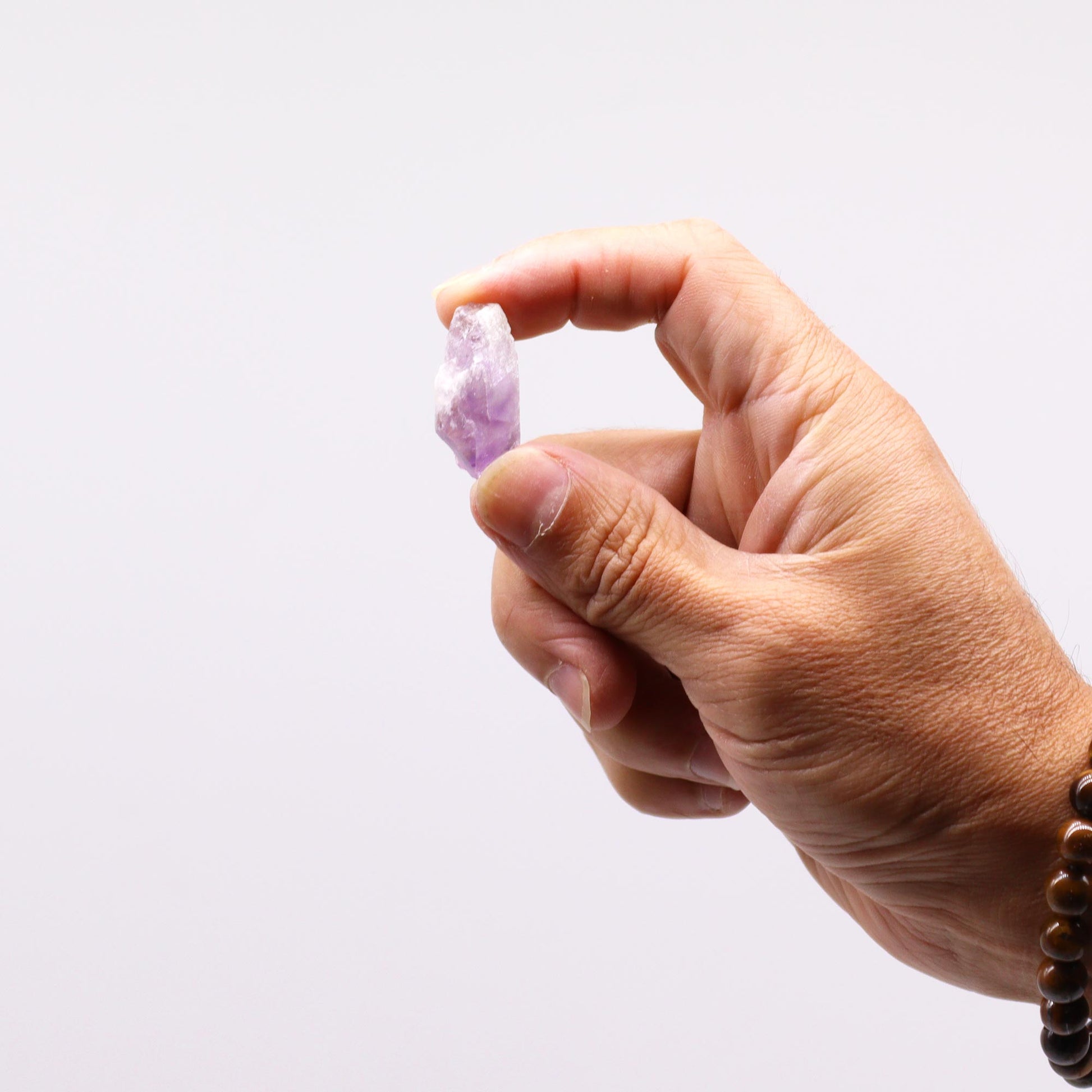 Raw Amethyst Rough Crystal Points | 100g Bags - Crystal Nest