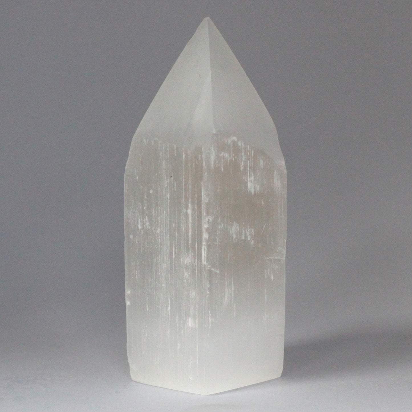Selenite Pencil Point Tower 15cm - Crystal Nest
