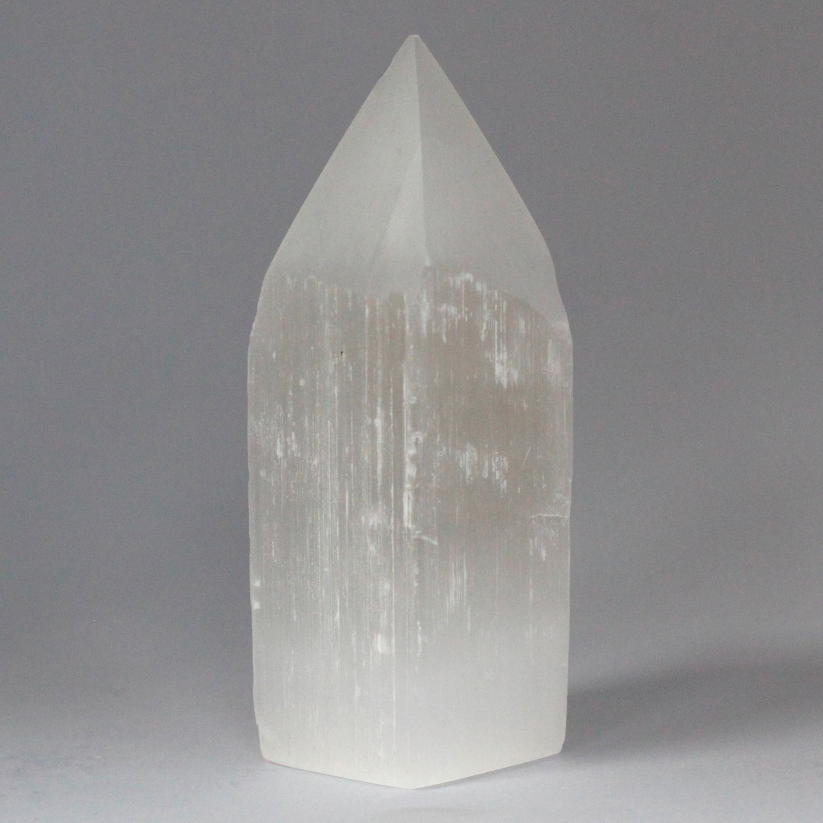 Selenite Pencil Point Tower 15cm - Crystal Nest